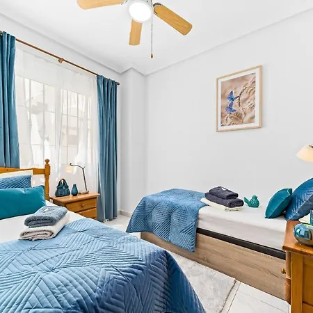 Pod Palmami /bajo Palmeras