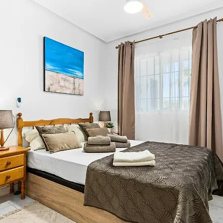 Pod Palmami /bajo Palmeras *